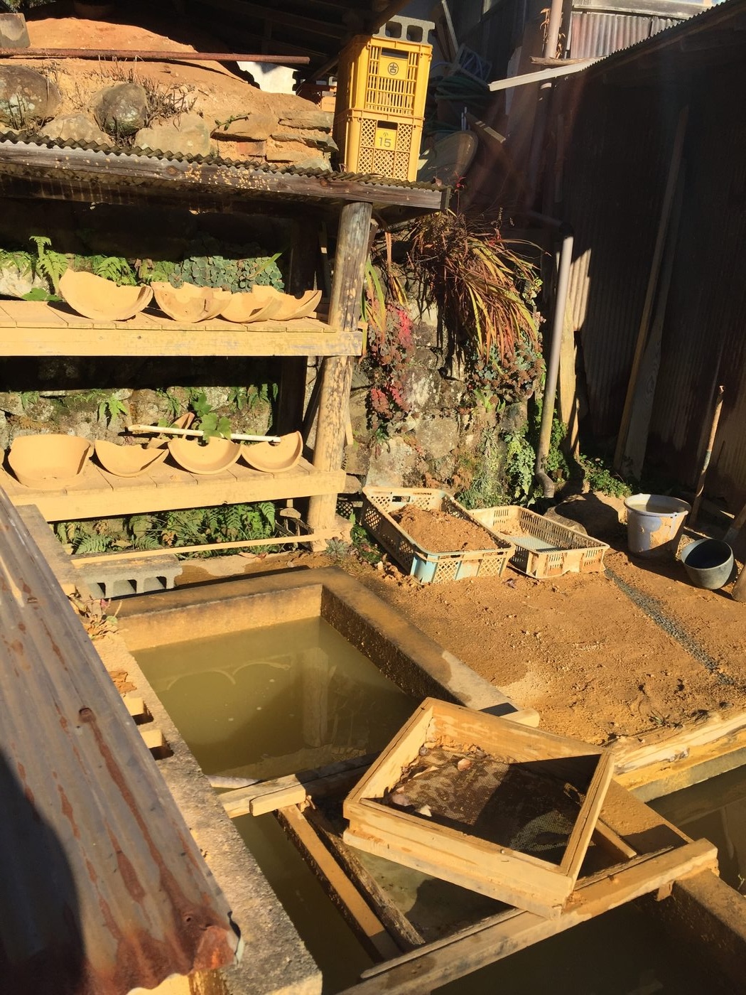 Clay preparation troughs at Onta